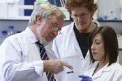 Professor Norman Maitland and members of his team