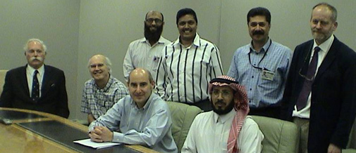 Geoff Bailey, Nic Flemming and Abdullah Alsharekh with Saudi ARAMCO staff at their Dharran headquarters, 2005