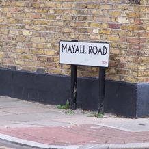 Street names now serve as markers and literal sign-posts to memories of the riots in 1981. 