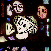 Detail of early 14th Century Penancer's Window showing female penitent, nave of York Minster
