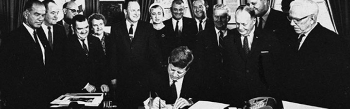 John F Kennedy signing the Fulbright-Hays Act, 1961, enacted to promote mutual understanding between the US and other countries, strengthening earlier legislation. (Far left, Senator Fulbright) Photo source: Fulbright.State.Gov