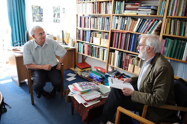 Two members of staff discussing