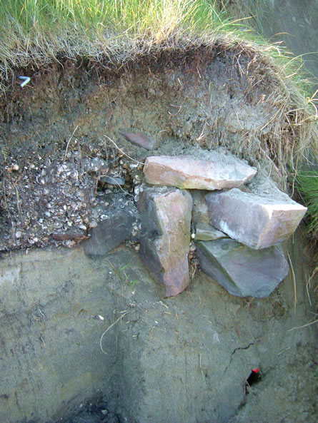 10.) Neolithic midden and wall