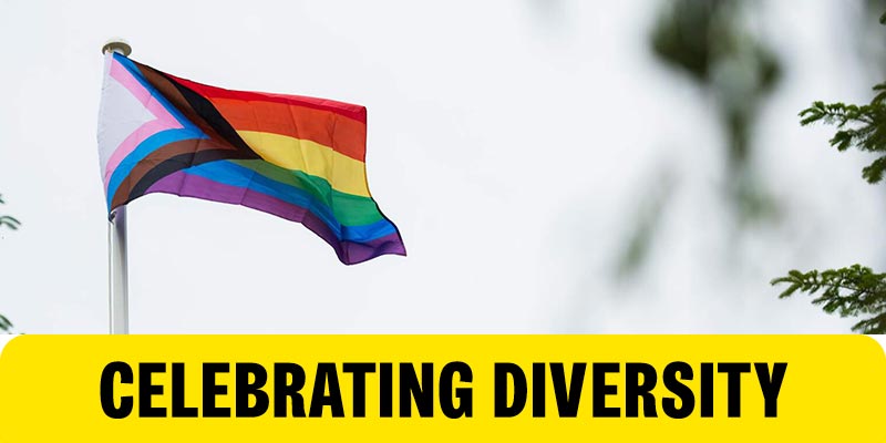 The Progress Pride Flag flies on campus. A banner at the bottom of the image reads 'Celebrating Diversity'.