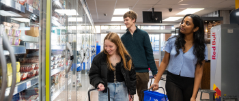 Three students shopping in Market Square Store