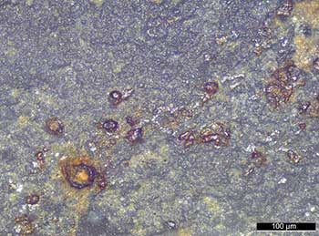 Red-orange amorphous deposits with droplet-like appearance on a blade stone tool from Star Carr
