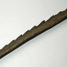 A Mesolithic objects from the Yorkshire Museum: This object was found at Star Carr and is called a 'barbed point'. It could have been used as a harpoon.