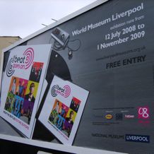 Billboard advertising the Beat Goes On exhibition at Liverpool World Museum. Photo: Brett Lashua. 