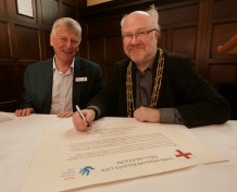 The Lord Mayor of York, Cllr Dave Taylor, signs the York Human Rights City declaration, with Stephen Pittam, chair of the York Human Rights City Steering Group.