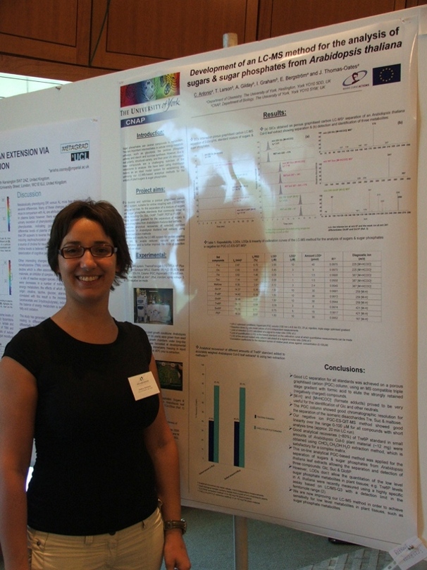 Carla Antonio with her poster at the Metabolomics meeting in Boston 2006.