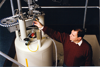 Graham Barlow and NMR instrument