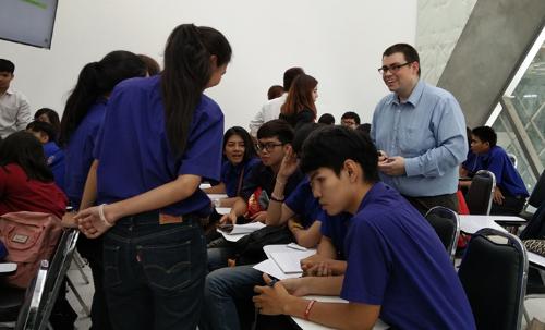 Andy Hunt with school children in a Thai classroom