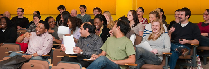 Students sit in a lecture theatre