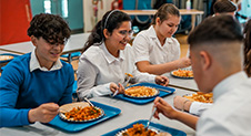 Children eating dinner at school