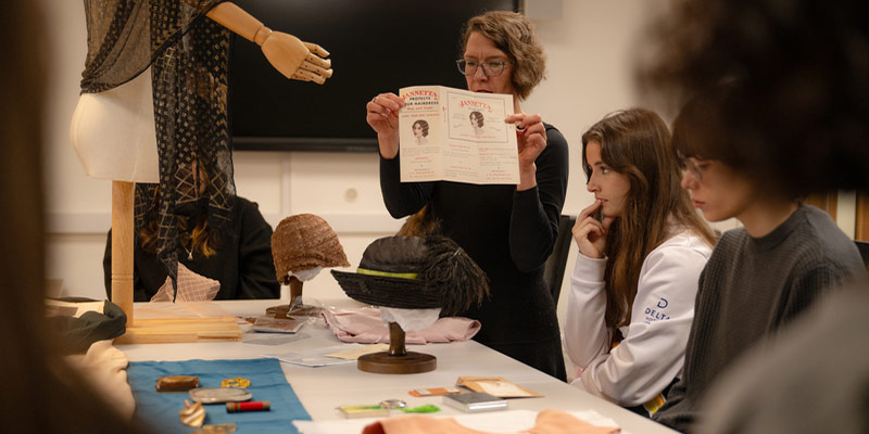 A group of MA students in a seminar about fashion history.