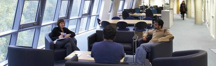 Several of our postgrads, at work in the postgrad space in the Berrick Saul building
