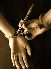 Handcuffs being unlocked using a pen
