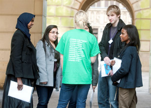 Students speaking to a Realising Opportunities representative