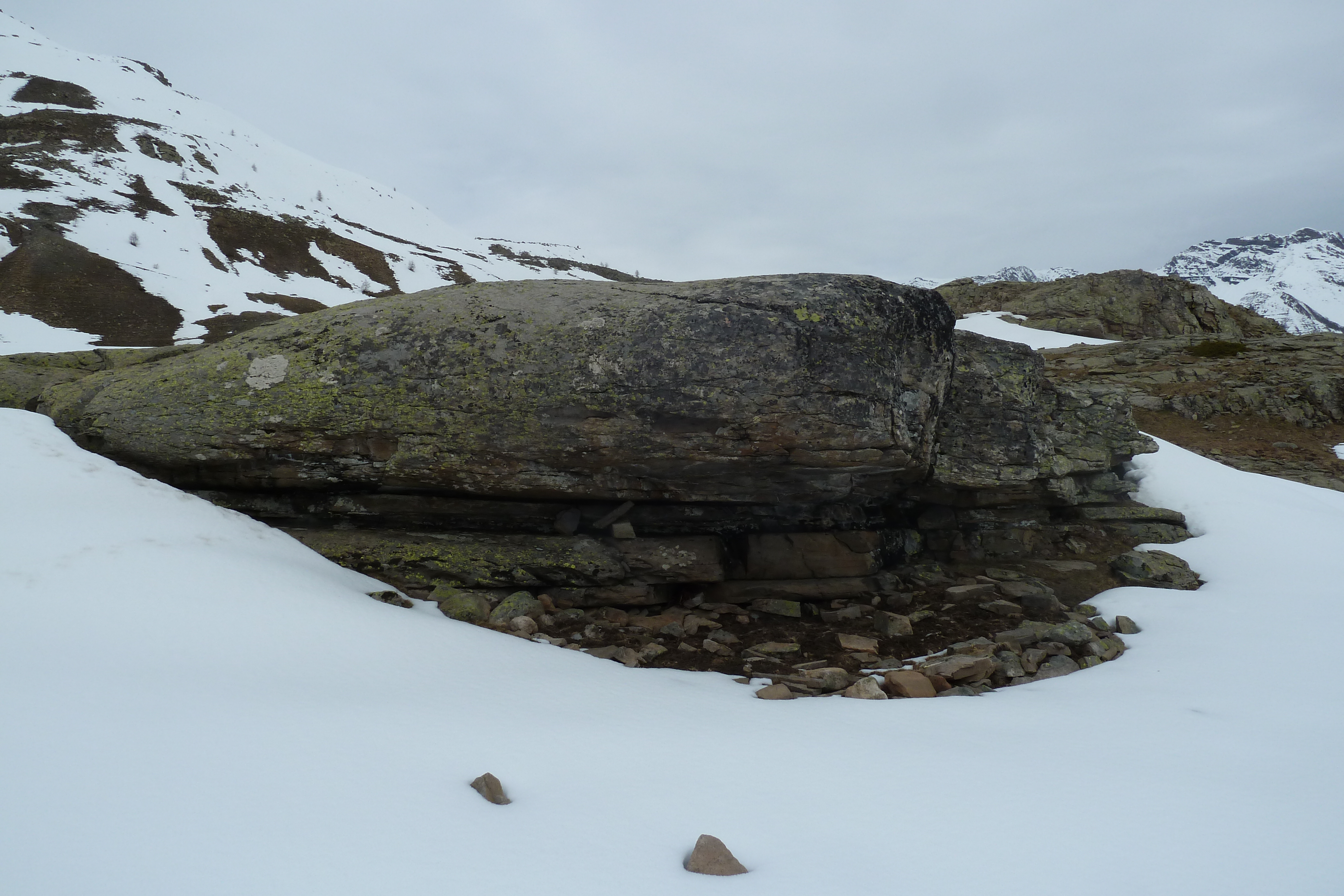 Image: The Abri Faravel, late winter – note how the zone below the under hang is protected from the snow (Photo: Jean-Philippe Telmon, Parc National des Ecrins)