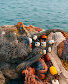 fishing nets, water in the background