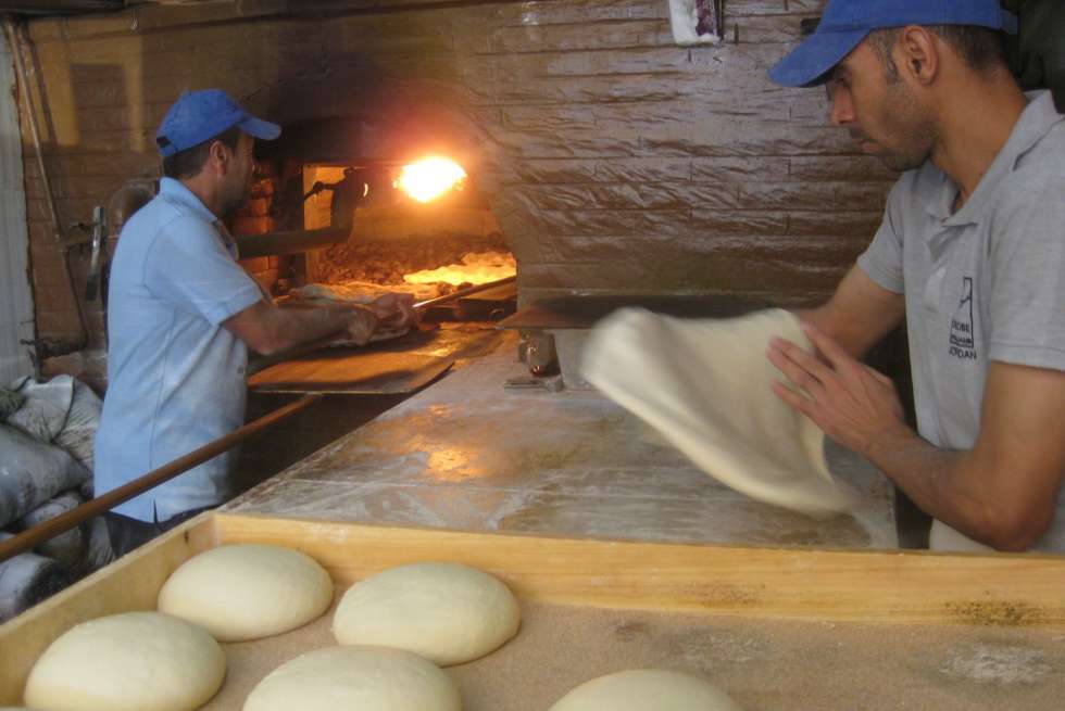 bakers making bread in an amman