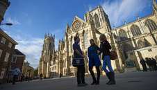 3 students stood outside York Minster