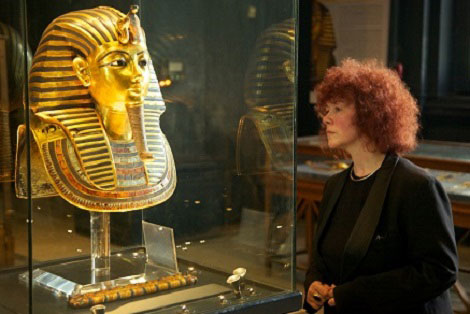 Professor Joann Fletcher with the Golden Mask of Tutankhamun. Credit:  Blink Films