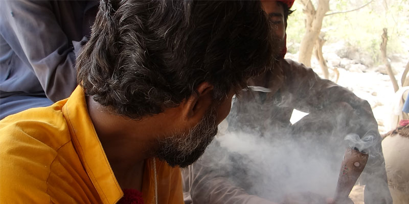 Man smoking in Pakistan