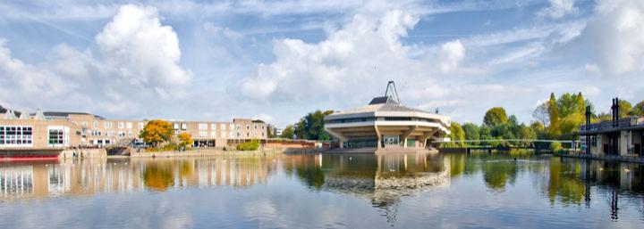 A picturesque view of the University's lake and Central Hall