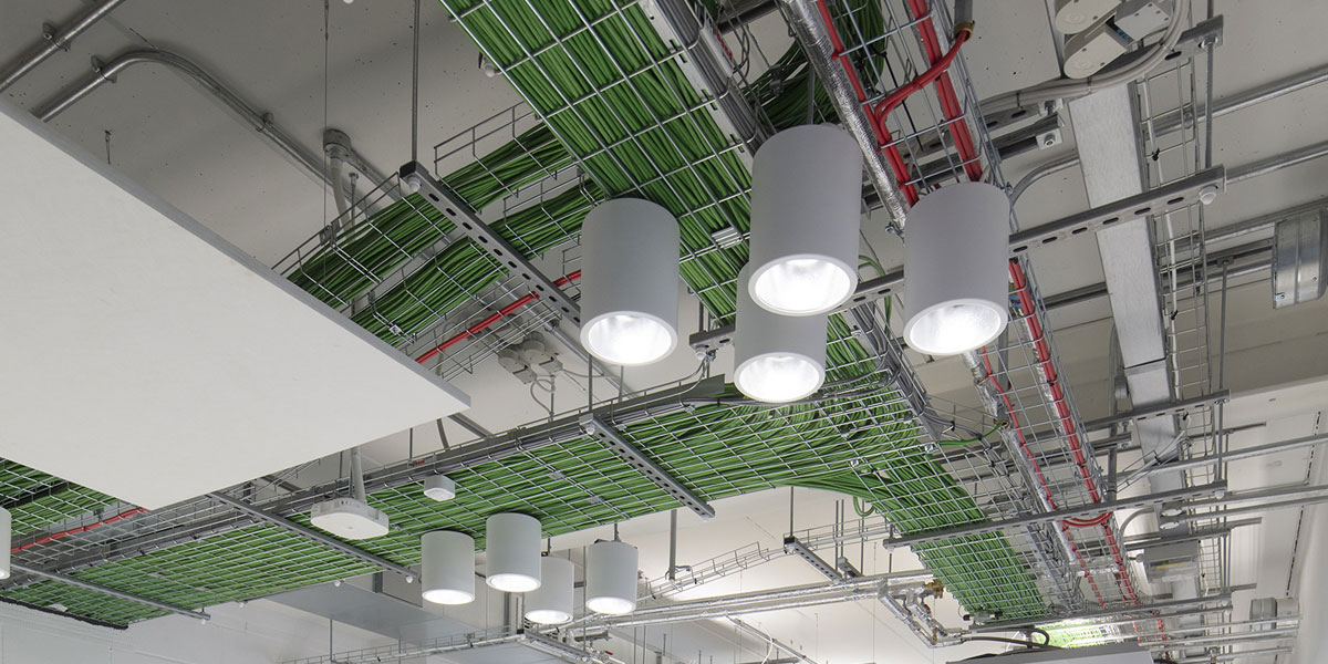 cabling, trunking and lighting in a laboratory ceiling