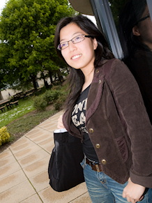 An SPSW student standing outside Cafe Barista, the coffee shop in the Seebohm Rowntree Building