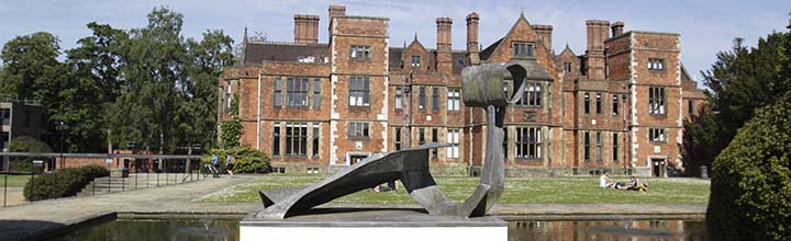 A view of the Dryad sculpture by Austin Wright with Heslington Hall in the background.