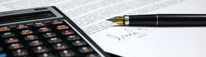 Banner image of pen, paper, and calculator