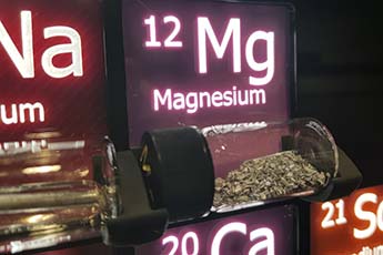 Photo of an exhibit made by Dept of Chemistry workshops for the York Festival of Ideas 2019 Periodic Table exhibition. The periodic table shown contains samples of each element. Close up on Magnesium.