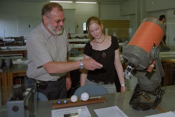 Physics Department Teaching Laboratory Manager Mat Hill with a student during the University of York Physics Fun Day, August 2005