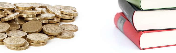 A pile of pound coins and a stack of books.