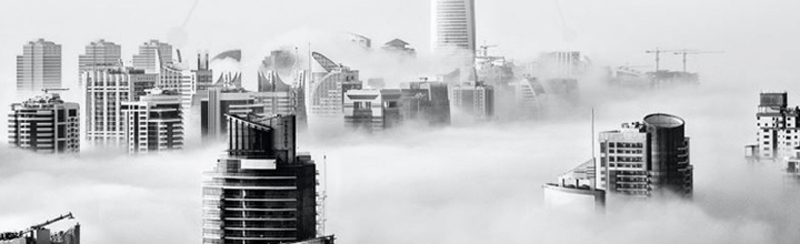 Image of the tops of skyscrapers in fog