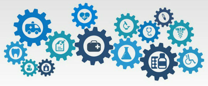 interconnecting cogs with healthcare symbols