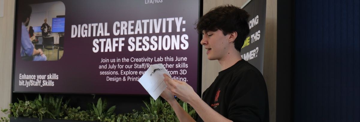 Alex presenting at an event