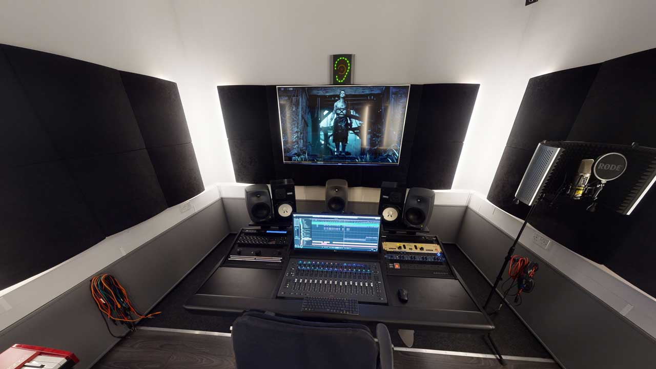 The studio console and a large HDTV for sound to picture work.