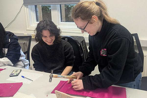 Trying out historic techniques of slashing textiles for decorative effect.