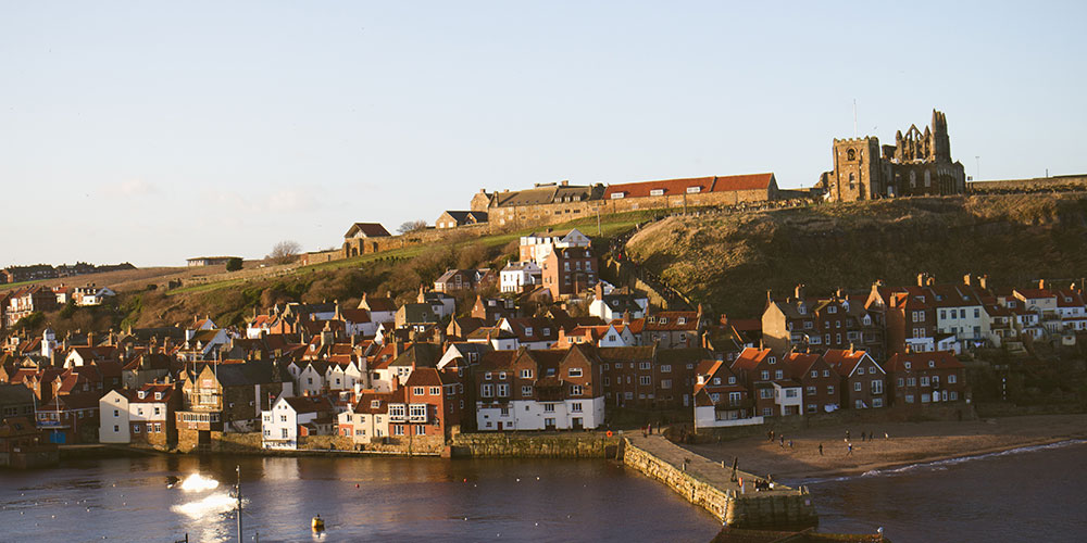 image showing the town of Whitby including the abbey and the river