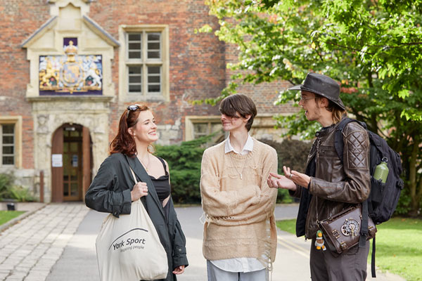 A group of students outside Kings Manor