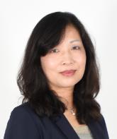Dr Jillian Ooi headshot photograph against a pale grey background