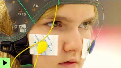 a 12-year-old pupil wearing an electroencephalogram (EEG) to measure brain response and sleep