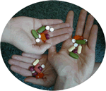 hands holding pills